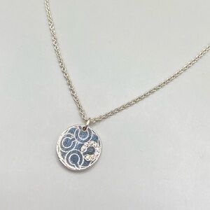 Coach Sterling Pave Op Art Disc Necklace